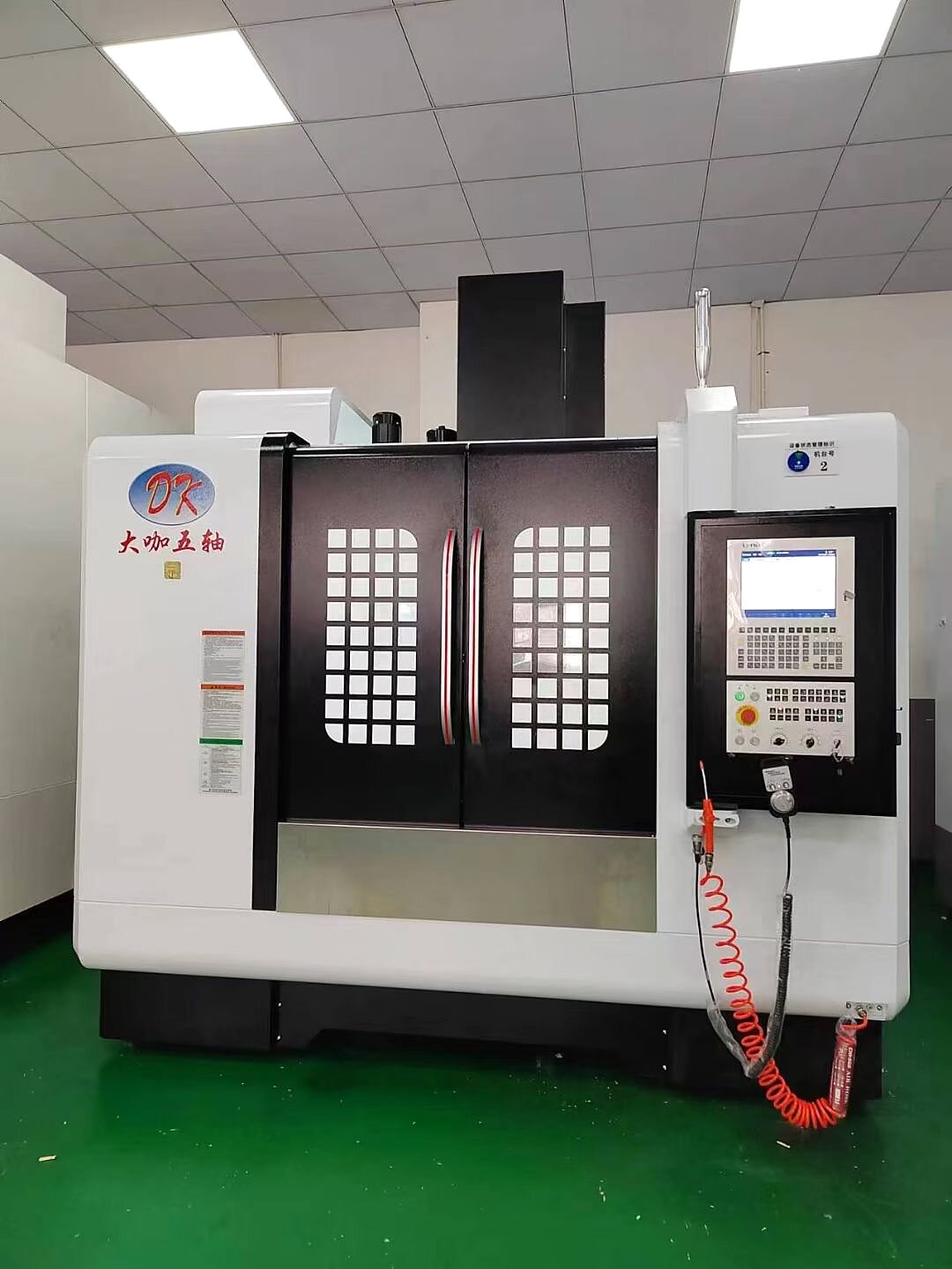 Five-axis CNC machining center in CNC Precision Tech workshop for complex machined parts